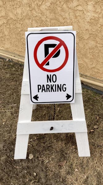 Wooden A-Frame with no parking sign
